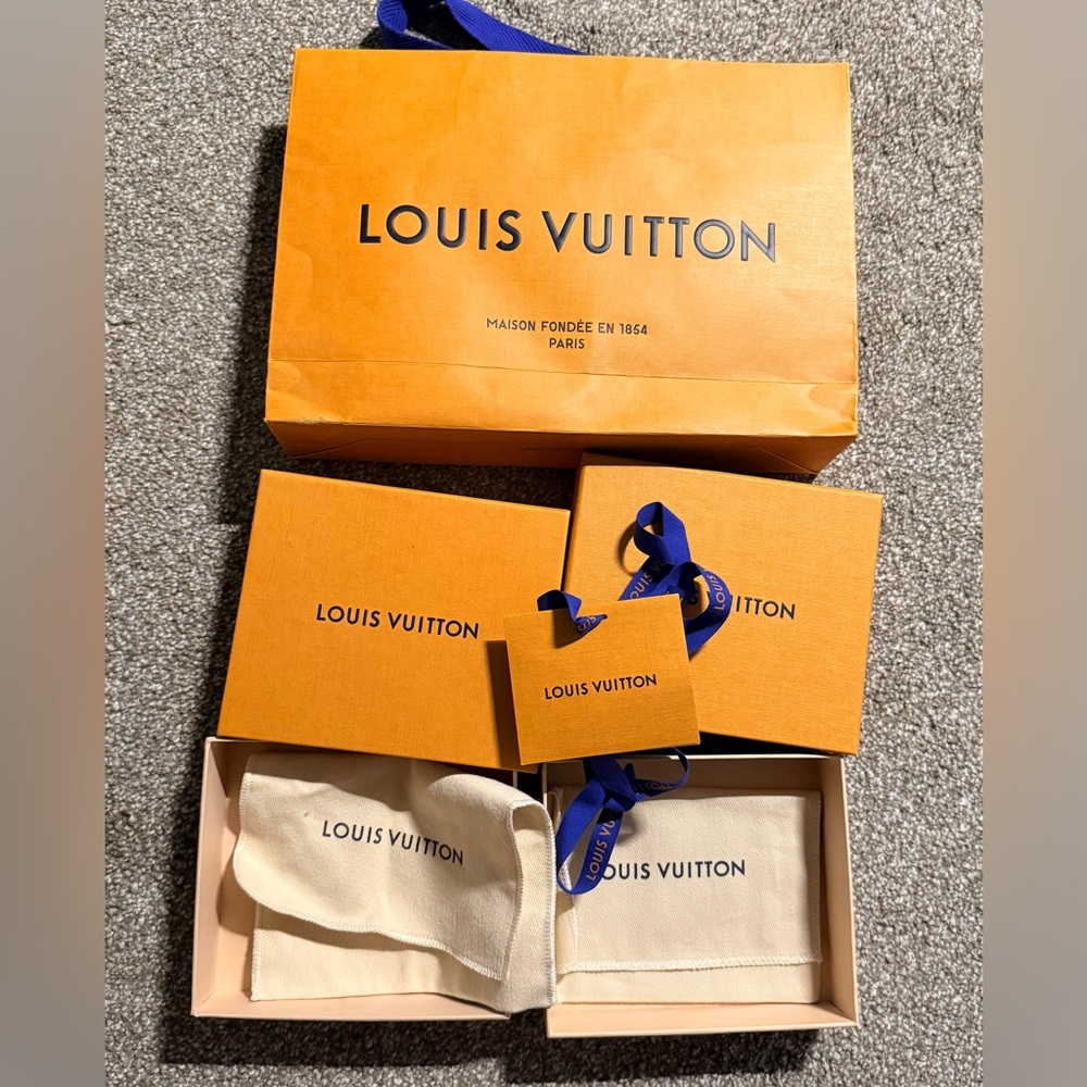 Authentic Louis Vuitton shopping bag and boxes